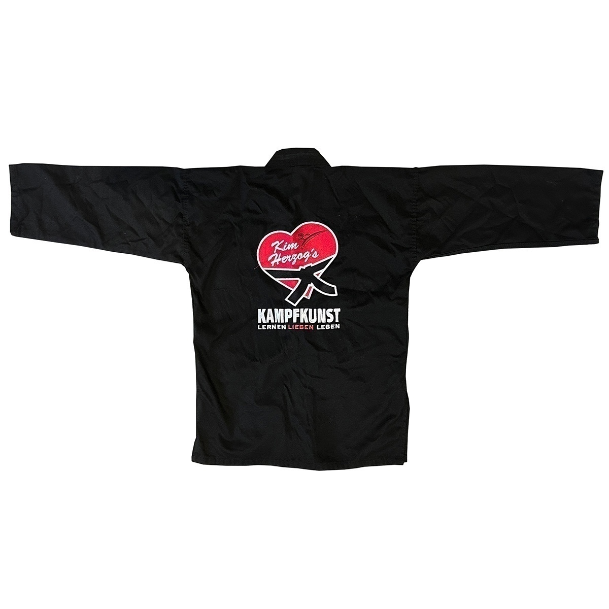 Kampfkunst-Anzug_schwarz_Jacke_vHinten_liegend